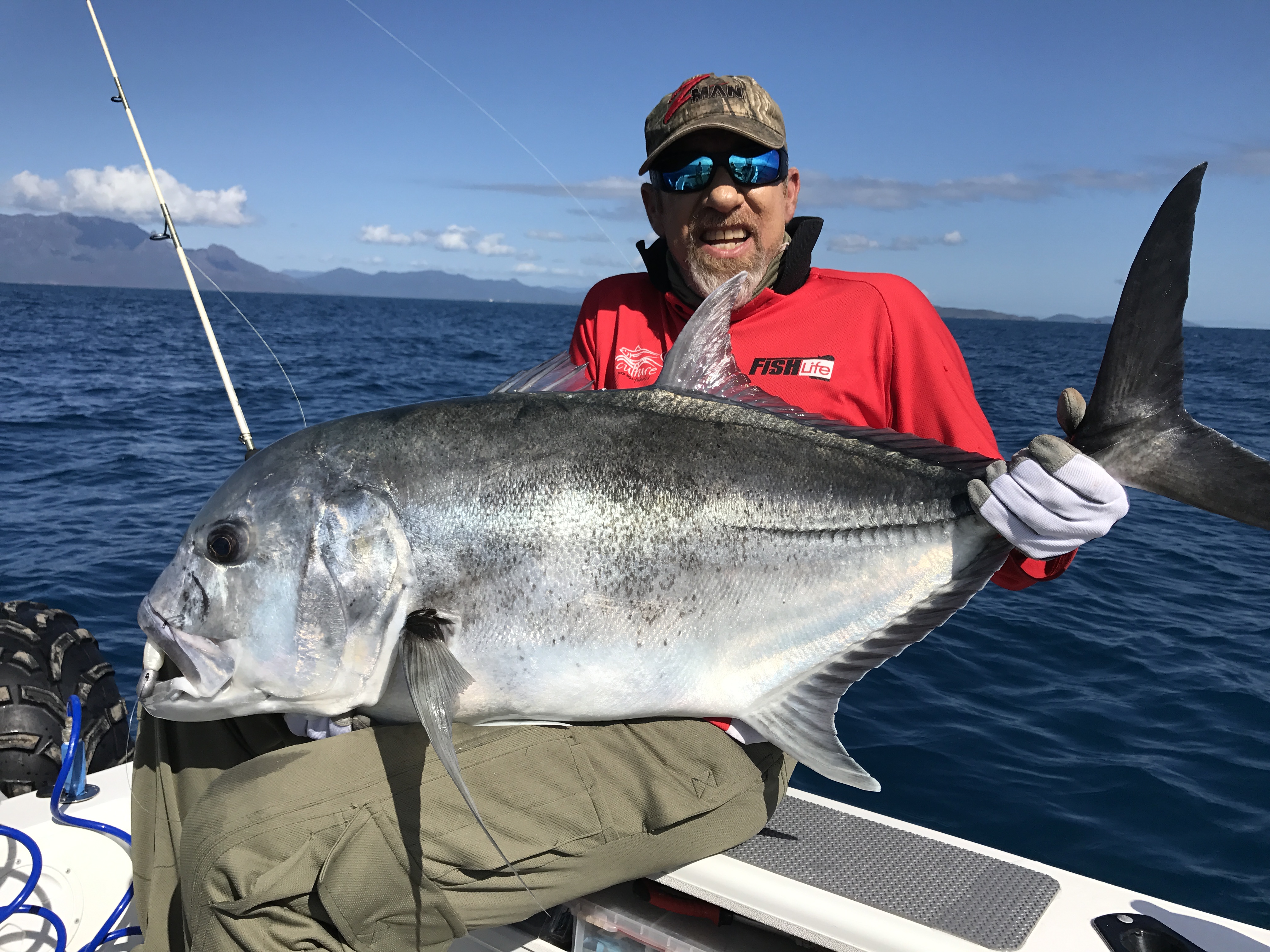 Robbie wells with a fish